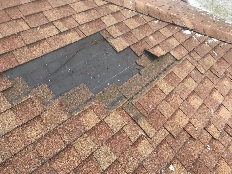 Roof that was damaged by Utah wind storm 